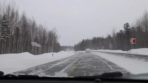 Driving on a winter road. Stock Footage 171893165