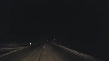 Driving on the winter road at night over the bridge Stock-Footage 85828216