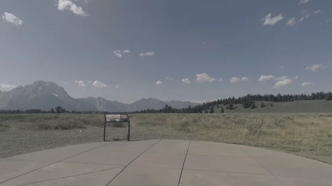 Driving in Yellowstone park, siteviewing, peaceful, sunny 2.7k Ultra HD Stock Footage 98574853
