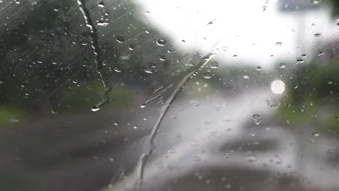 Drizzle on the car window Stock Footage 272588209