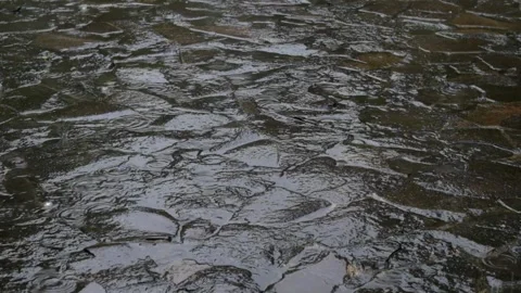 Drizzle fell on the yard with a stone floor Stock Footage 291916878
