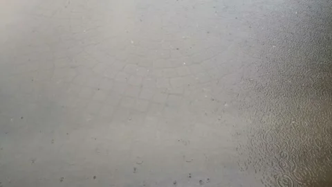 Drizzle pooled on the stone floor Stock Footage 197042834