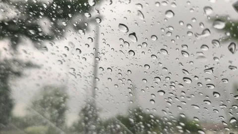 Drizzle Raindrops Falling and Sliding on Tilted Glass Surface Sky View Stock-Footage 346161718