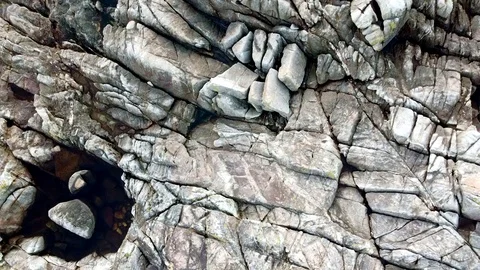 Droe flight above the rocks of the coast in Galicia, Spain Stock Footage 122467567