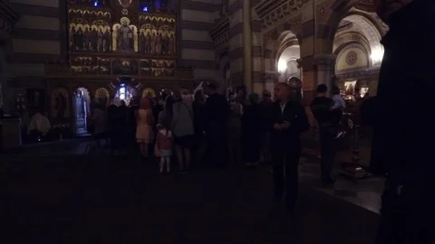 DROGOBYCH, UKRAINE - 3 MAY, 2019: Group of pilgrims in church. Praying people Video stock 108850375