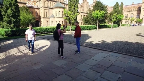 DROGOBYCH, UKRAINE - 3 MAY, 2019: Young woman with video camera in hands 스톡 동영상 108851143
