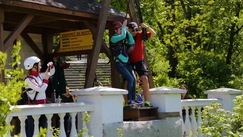 DROGOBYCH, UKRAINE - 3 MAY, 2019: Sports trainer pushing girl. People practicing 스톡 동영상 108853434