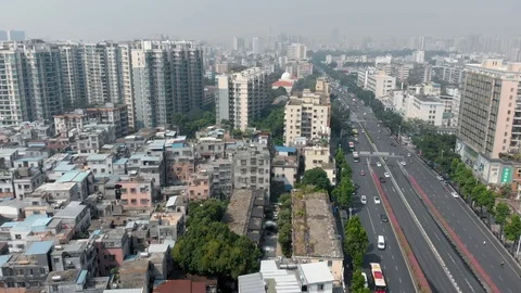 Dron flies over the lively district in Guangzhou. Stock Footage 118143285