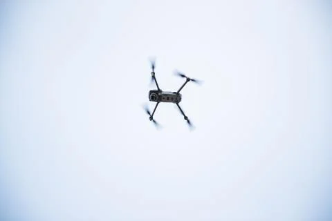 Dron overlooking the landscape in the background of a forest and village duri Stock-Fotos