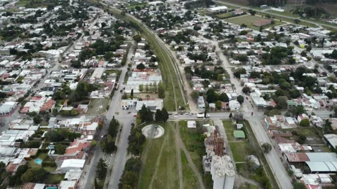 Dron shot above small town in northern Argentina - Tilt movement Stock Footage 220444976