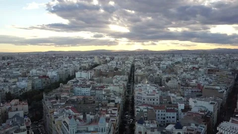 Dron shot over the gran via de Valencia España , buildings and sunset, Vidéo 135271199