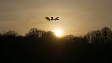 Dron at sunset in the rays of the setting sun Stock-Footage 88619732