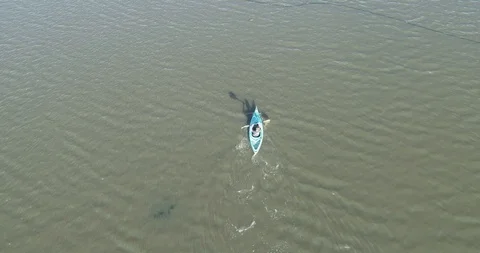 Dron view of canoe being paddled Stock Footage 100614987
