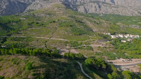 Drone 4k aerial flight across the mountains at the sea coast Stock Footage 201729591