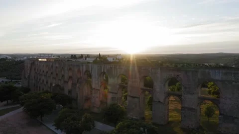 Drone 4k Aqueduct on sunset next to the city of Elvas - Pull Video stock 169704026