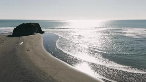 Drone 4k beach sunset New zealand at three sisters rock formation Stock Footage 311310182