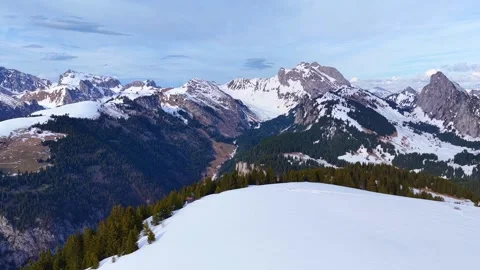 Drone 4K forward over snowy alpine plateau and peaks Stock Footage 332412734