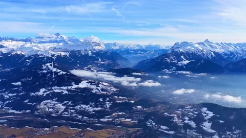 Drone 4K panoramic rotation over alpine lake and peaks Stock Footage 329911581
