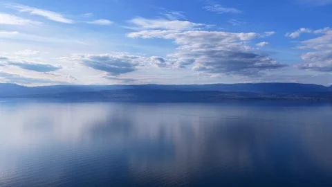 Drone 4K Pullback Lake Leman Calm Water Boat Stock Footage 332152408