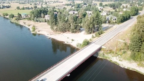 Drone 4k shot of car driving over a bridge Stock Footage 101399063