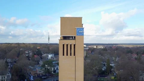 Drone 4k shot of clock tower Hilversum Town Hall boom movement up Stock Footage 147880116