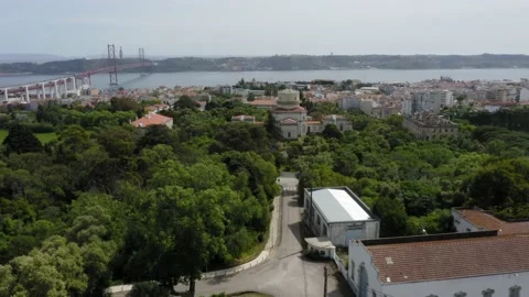 Drone 4k Urban Nature with fields and river backdrop in Lisbon, Portugal Stock Footage 169764356
