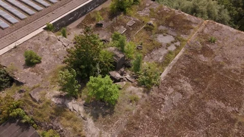 Drone 4K view of the destroyed exterior from top of Bunker WW2 valentin 動画素材 334232572