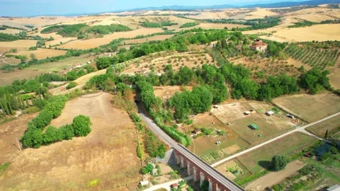 Drone 4K view rail bridge Typical Italian-Siena  hill panorama Stock Footage 230994915