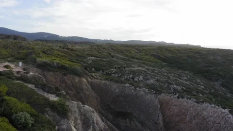 Drone 4k Zooming out on Cliff and villages behind in Sintra, Portugal Video stock 169771853