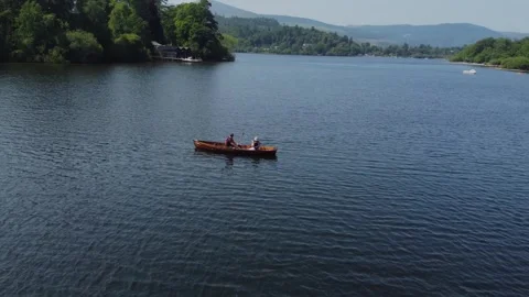 Drone 50fps. Rowing boat. Lake District National Park, Cumbria, UK. 1.7.2026 Stock Footage 340039601