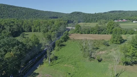 Drone Above and Chasing View of a Doubleheader Steam Passenger Train, Trave.. Stock Footage 235959090