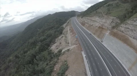 Drone above highway in mountains  Stock Footage 62525440