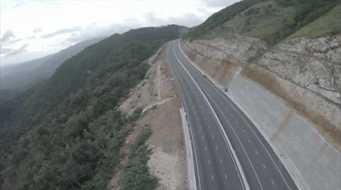 Drone above highway in mountains Stock Footage 62525884