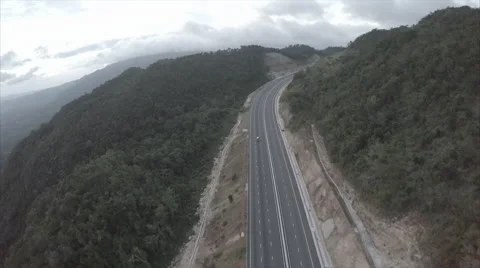 Drone above highway in mountains Stock Footage 62526048