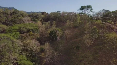 Drone from above a zip liner as they go down Stock Footage 108602718
