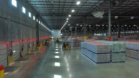 Drone across a warehouse loading bay Stock Footage 97268672