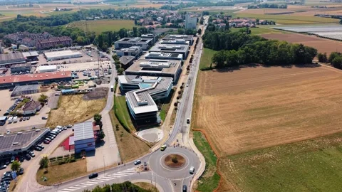 Drone Advances Over Roundabout And Farmland Stock Footage 346891794