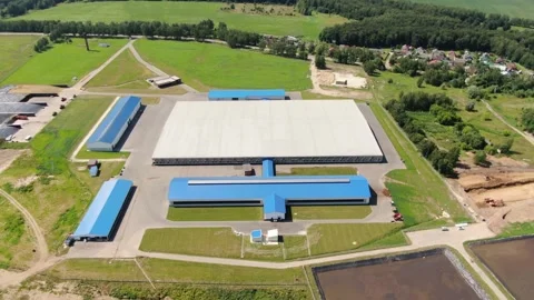Drone advancing over farm complex with tilt down Stock-Footage 333278767