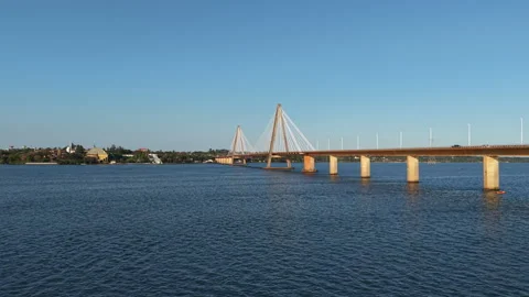 Drone advancing over the Paraná River and revealing the San Roque González Stock-Footage 317677051