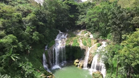 Drone Advancing Toward Emerald Waterfall Lagoon in Karst Landscape Guangxi Stock Footage 330279918