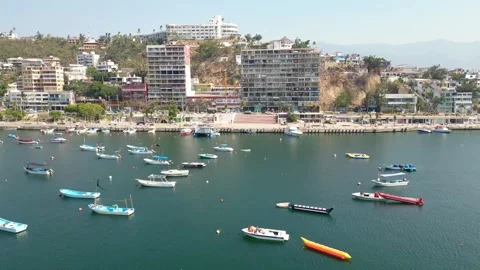Drone advancing toward Paseo del Pescador in Acapulco Stock Footage 296020558