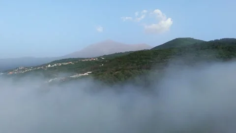 Drone Aerial 4K Flight Over Clouds with Teide volcano at Sunset Stock Footage 314600761
