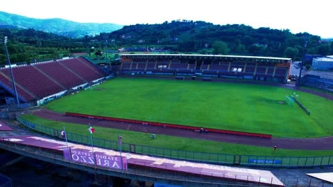 Drone Aerial 4K Flight view Pan orbit Tuscany Skyline City Stadium Stock-Footage 242808824