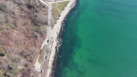 Drone aerial cargo ship moving across tranquil green ocean 스톡 동영상 331234504