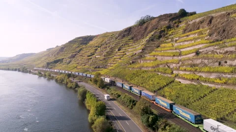 Drone aerial cargo train wineyard winningen German Wine Region Moselle River Stock Footage 165494380