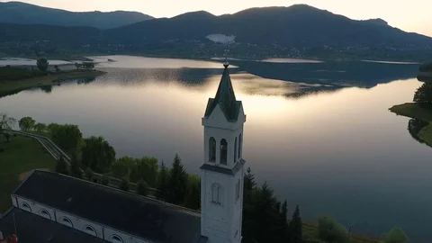 Drone aerial circular view of the Rama Scit church tower in Franciscan monastery Video stock 80327159