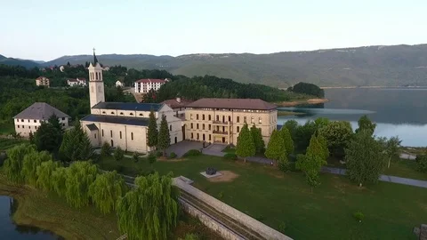 Drone aerial circular view of the Rama Scit church tower in Franciscan monastery Video stock 80327708