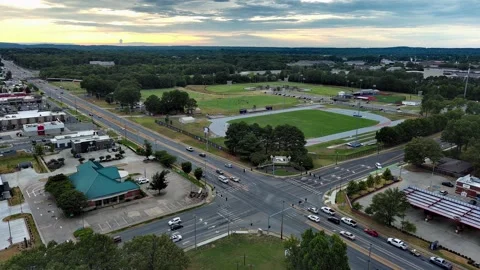 Drone aerial of city intersection traffic moving north and south Stock Footage 202205455