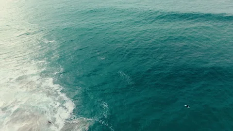 Drone aerial close view of calm Pacific Ocean surface near Pacific Beach Stock Footage 339252539