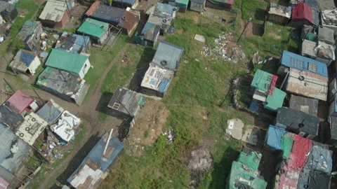 Drone aerial directly over a squatter settlement Stock Footage 239498923
